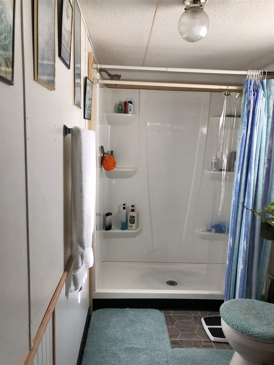424 32 Road, Unit 179 Clifton, CO 81520 - Photo 5 of 7 a bathroom with a shower and a sink