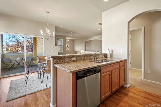 a kitchen with a stove and cabinets