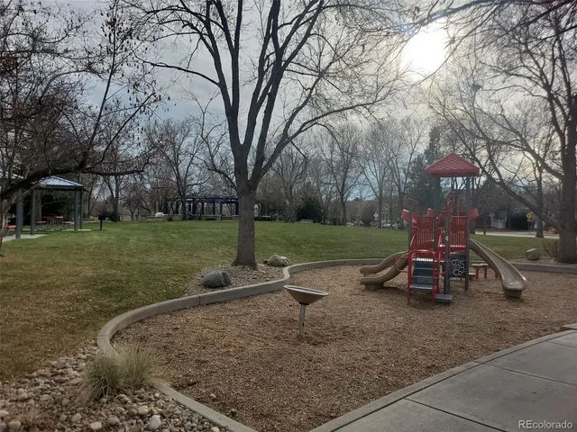 a view of outdoor space with swimming pool and sitting area