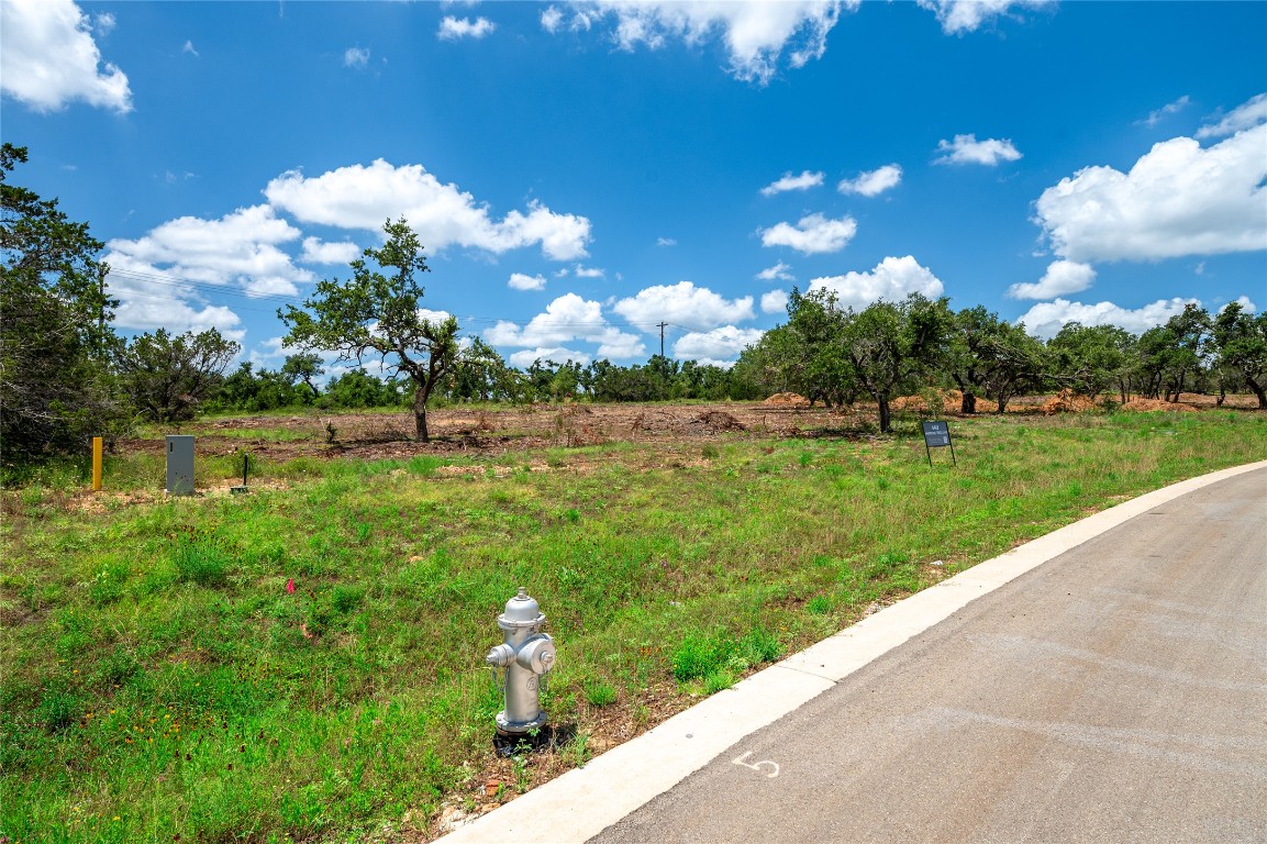 6413 Madrone Tree Lane Austin, TX 78738 - Photo 3 of 11 a view of a lake with a big yard