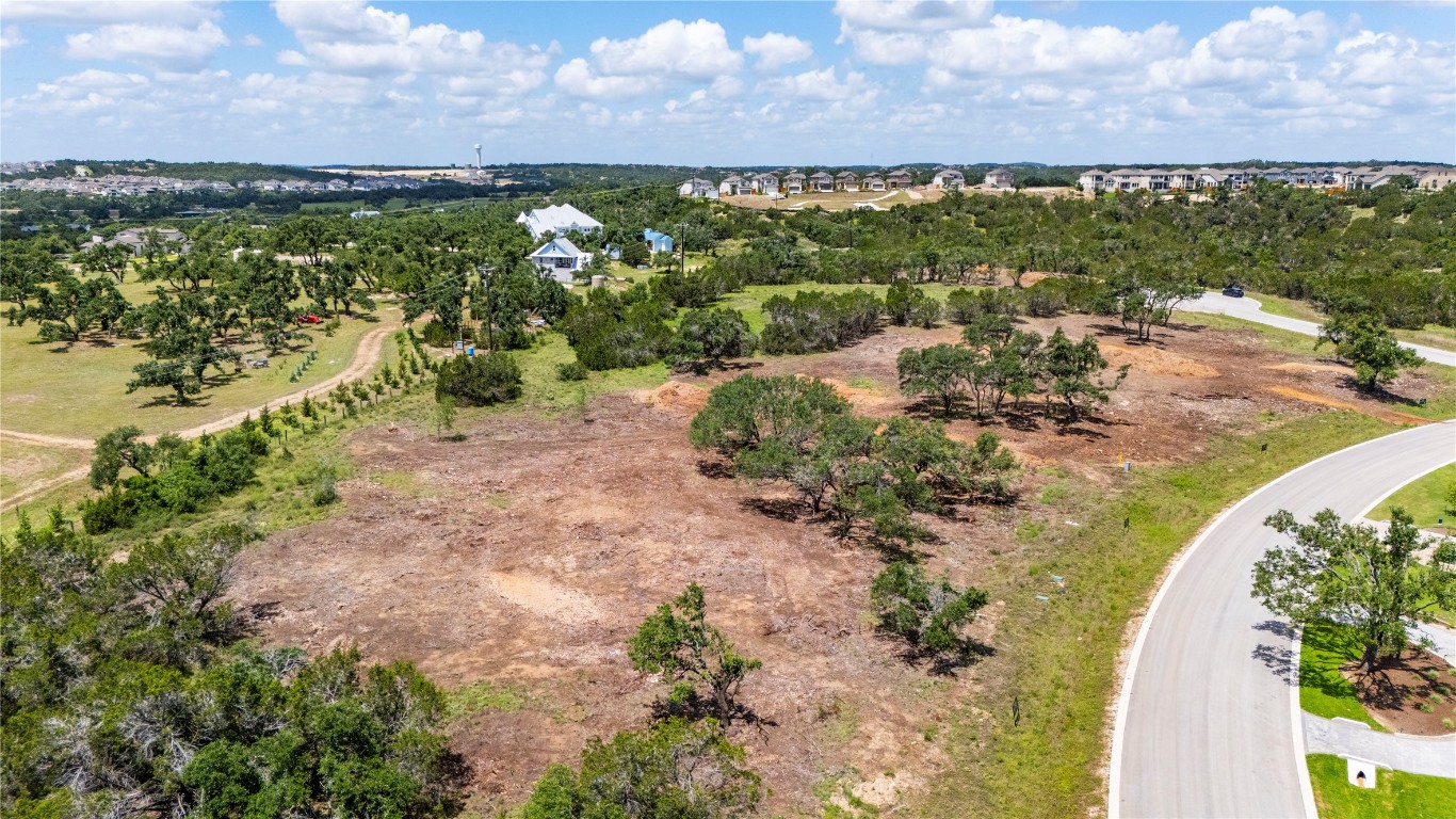 6413 Madrone Tree Lane Austin, TX 78738 - Photo 4 of 11 a view of a lake with a yard