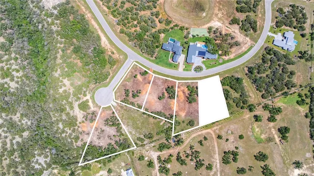 a kitchen with a table and chairs in it