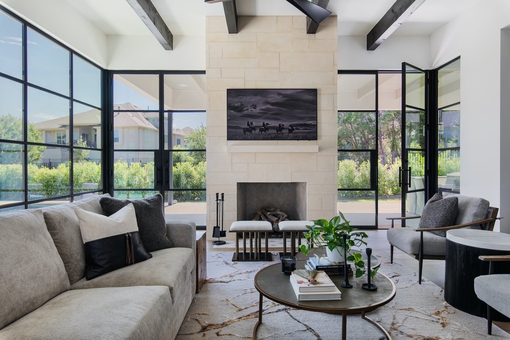 6413 Madrone Tree Lane Austin, TX 78738 - Photo 6 of 11 a living room with furniture potted plant and a large window
