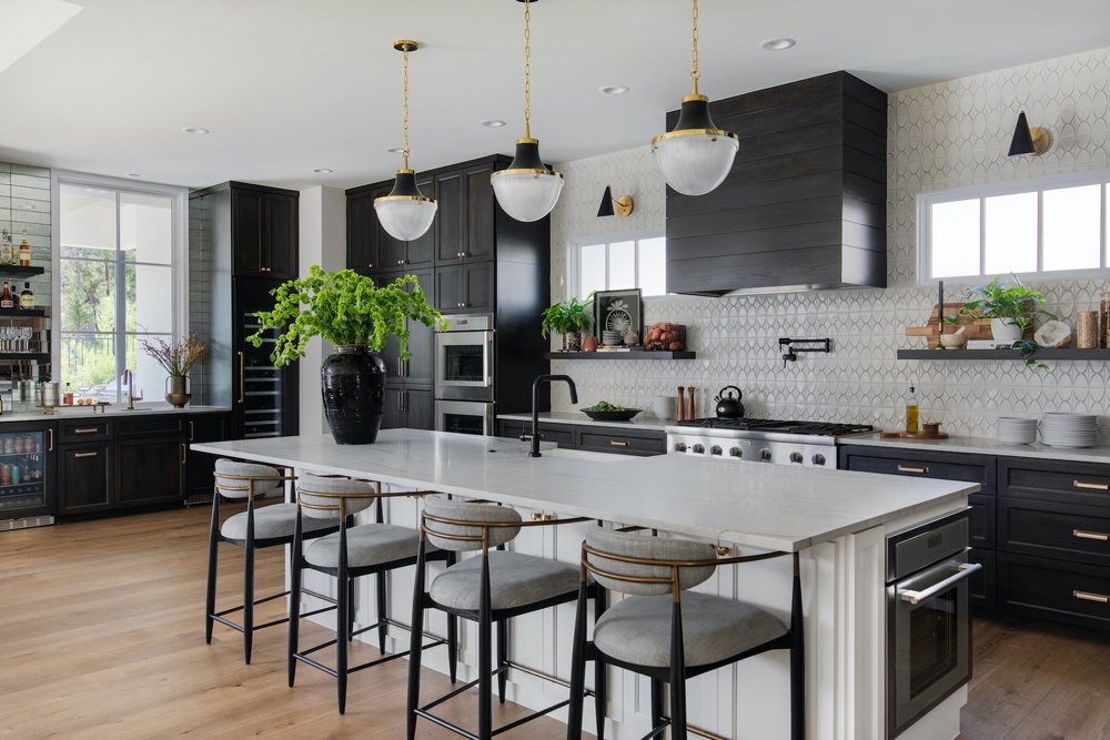 6413 Madrone Tree Lane Austin, TX 78738 - Photo 7 of 11 a kitchen with a table and chairs in it