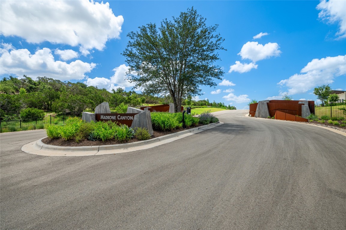 6413 Madrone Tree Lane Austin, TX 78738 - Photo 8 of 11 a view of a house with a street