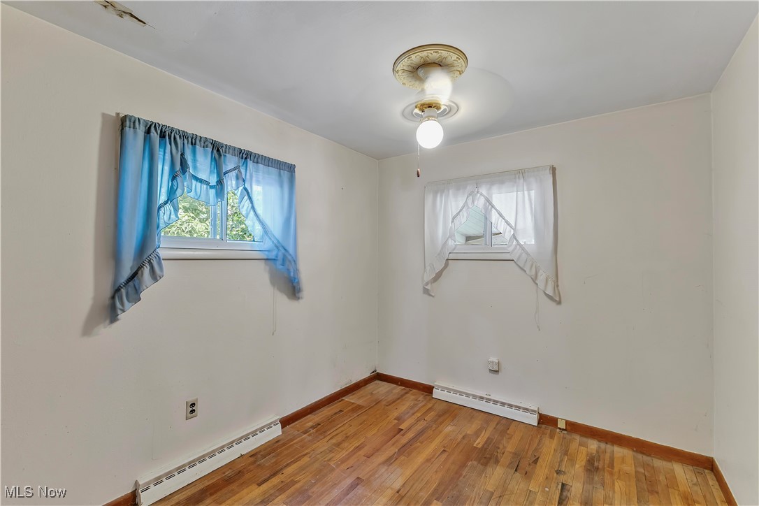 321 Overlook Road Vermilion, OH 44089 - Photo 21 of 27 Bedroom featuring hardwood flooring.