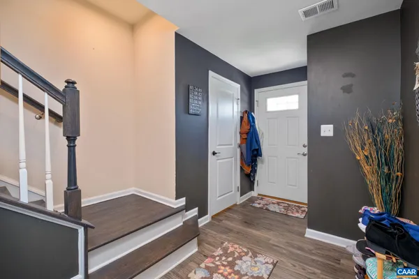 a room with furniture and a window