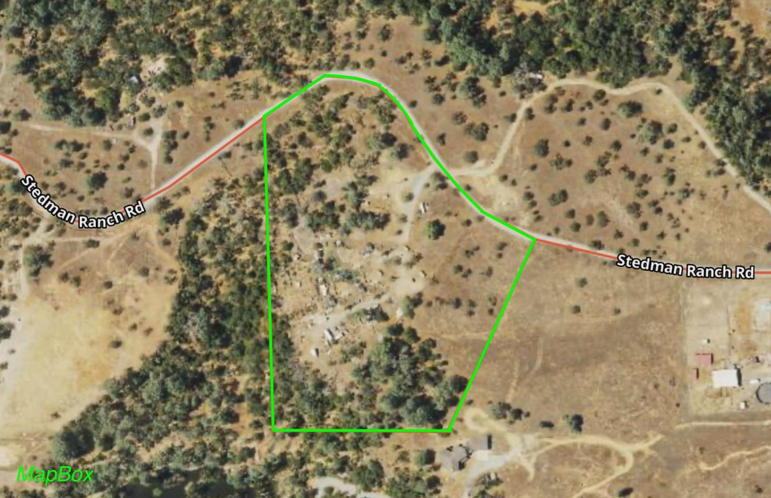 12874 Stedman Ranch Road Burson, CA 95225 - Photo 19 of 19 a black and white painted wall with a garden