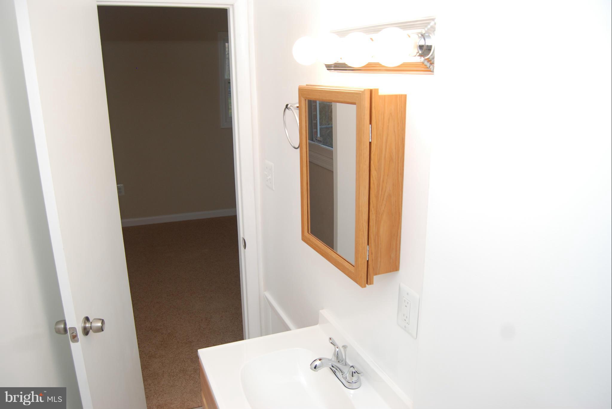 1426 Columbia Beach Road Shady Side, MD 20764 - Photo 17 of 23 Half bathroom
