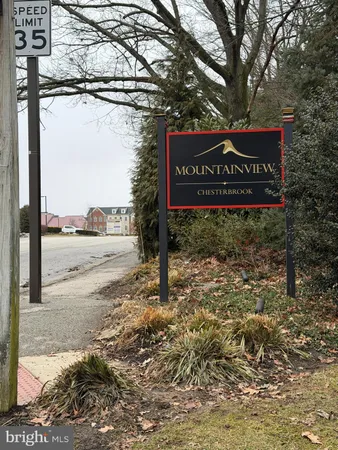 a sign broad on the side of the road