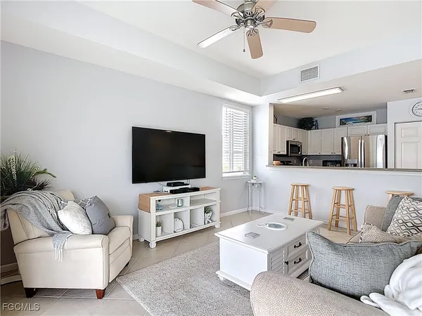 a living room with furniture and a couch