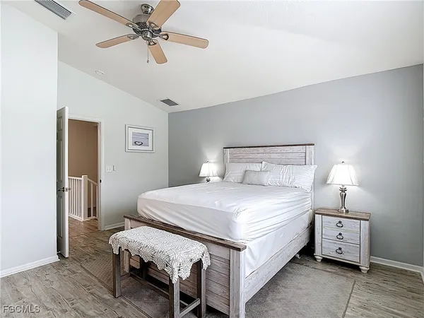 a bathroom with a sink vanity granite and a mirror