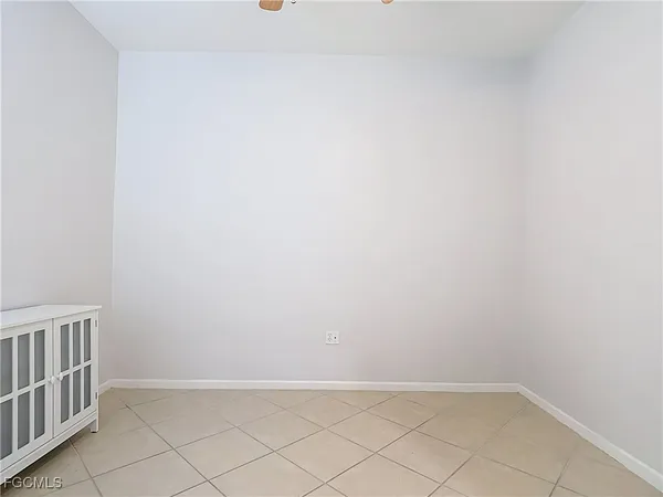 a view of a kitchen with a sink dishwasher and fireplace