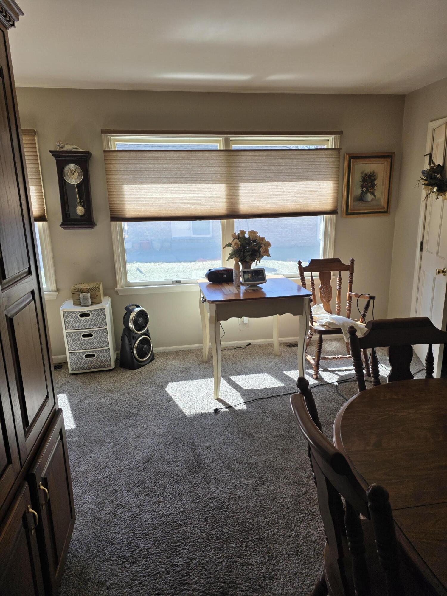 516 Begonia Street Southeast, Unit A De Motte, IN 46310 - Photo 13 of 25 a living room with patio furniture