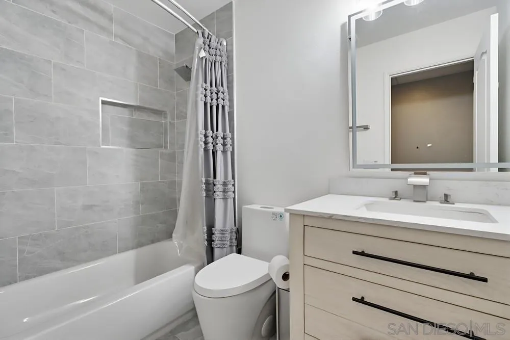2170 Bobcat Court, Unit 126 Chula Vista, CA 91915 - Photo 22 of 28 a bathroom with a sink toilet and shower