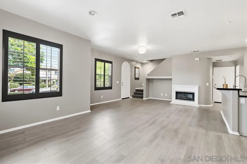 2170 Bobcat Court, Unit 126 Chula Vista, CA 91915 - Photo 6 of 28 a view of a livingroom with a fireplace and window