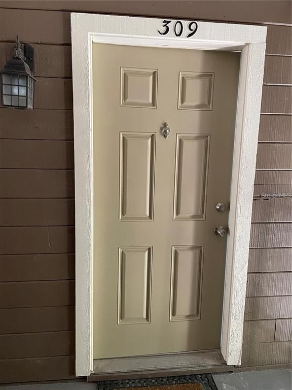 199 Afton Square, Unit 309 Altamonte Springs, FL 32714 - Photo 1 of 17 a view of a wooden door