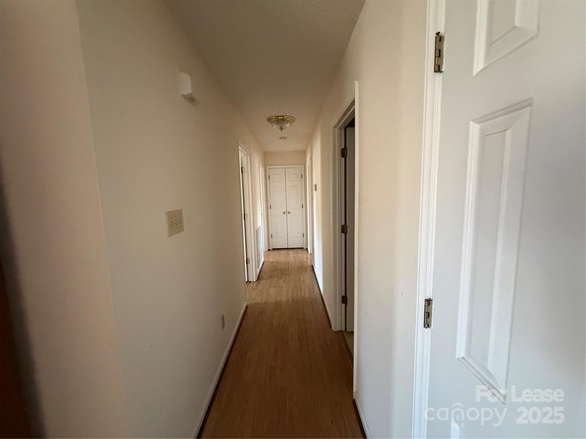 401 Miller Farm Road Statesville, NC 28625 - Photo 5 of 18 a view of a hallway with a wooden floor