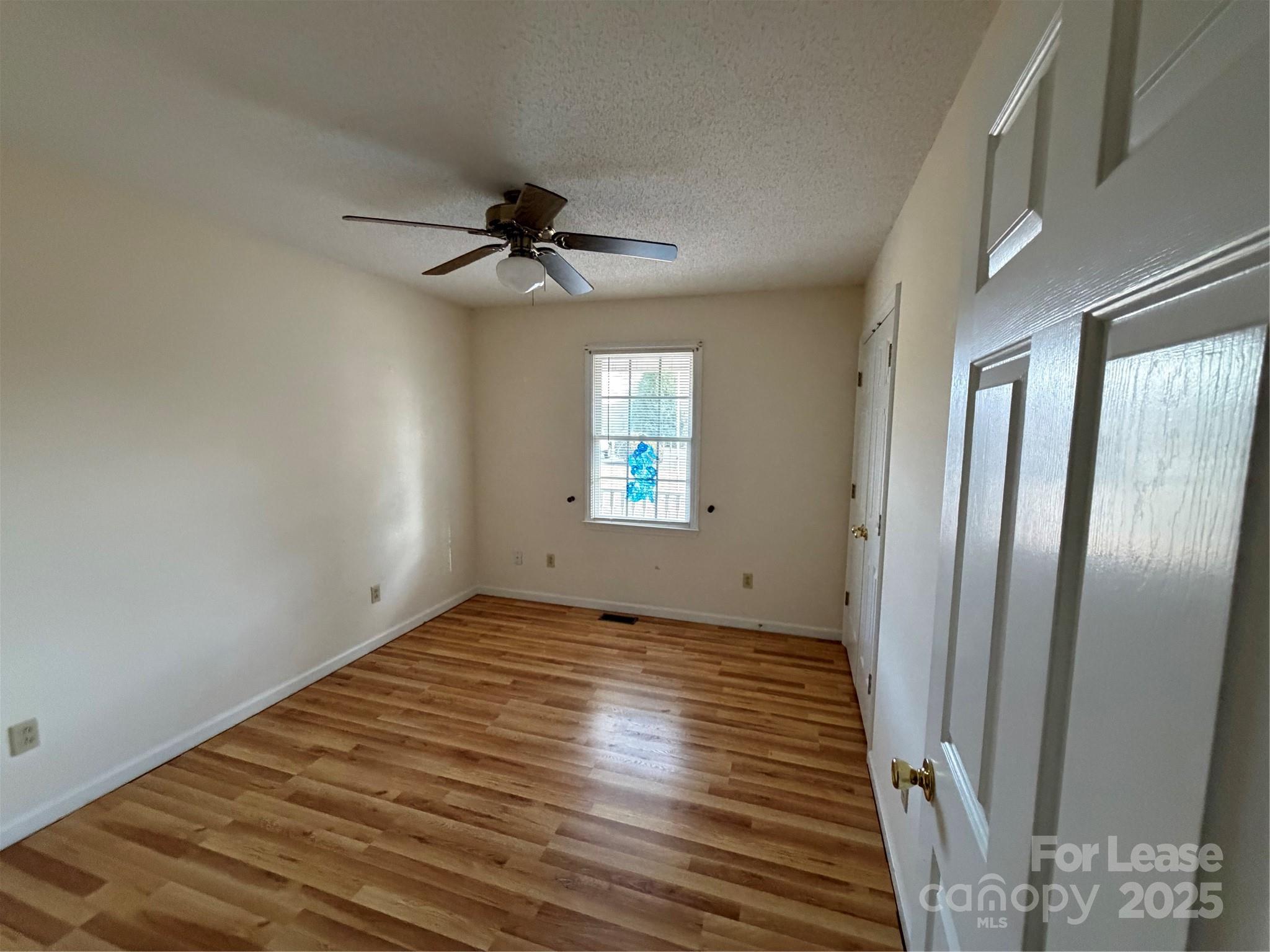 401 Miller Farm Road Statesville, NC 28625 - Photo 6 of 18 a view of an empty room with a window