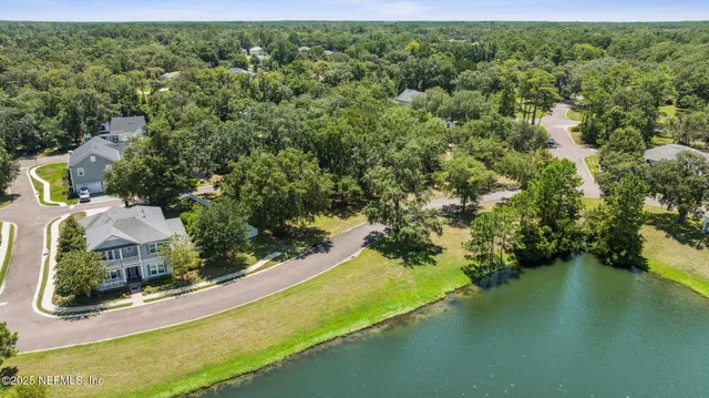 a view of a garden with a lake view