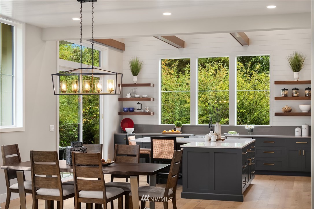 23511 7th Avenue Southeast Bothell, WA 98021 - Photo 3 of 28 a view of a dining room with furniture window and outside view