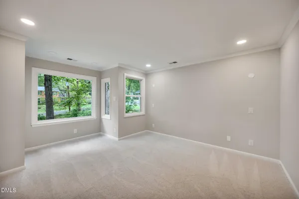 an empty room with windows
