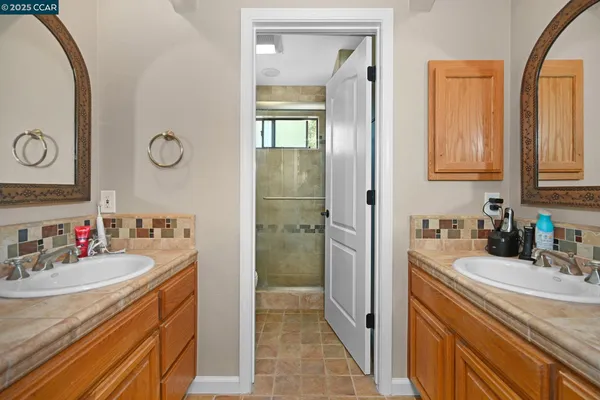 a view of a bathroom sink and mirror
