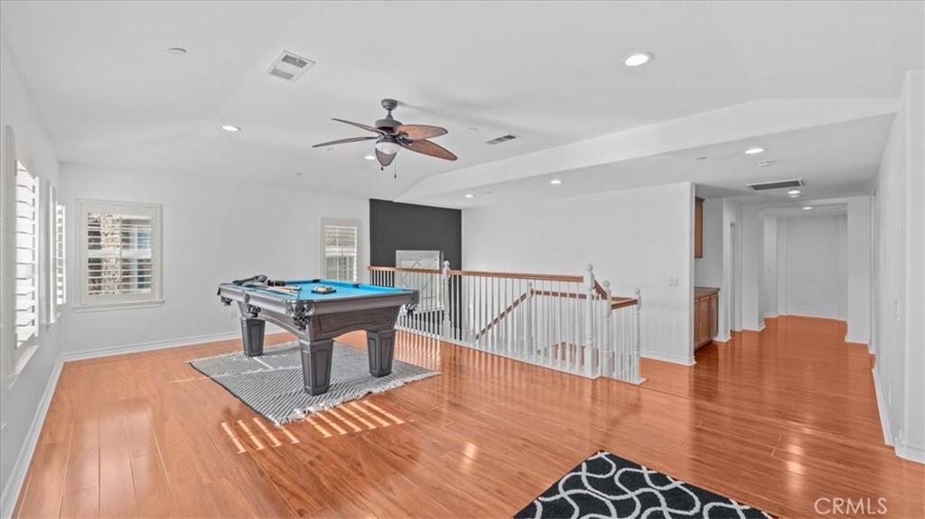 5448 Turin Way Fontana, CA 92336 - Photo 12 of 40 a view of a livingroom with furniture and wooden floor