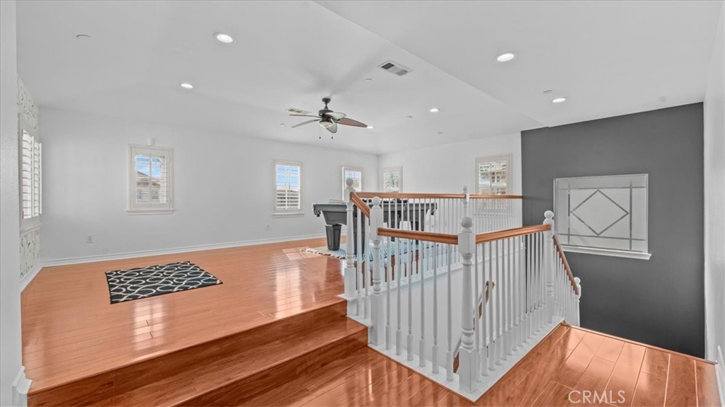 5448 Turin Way Fontana, CA 92336 - Photo 13 of 40 a view of a hallway with windows