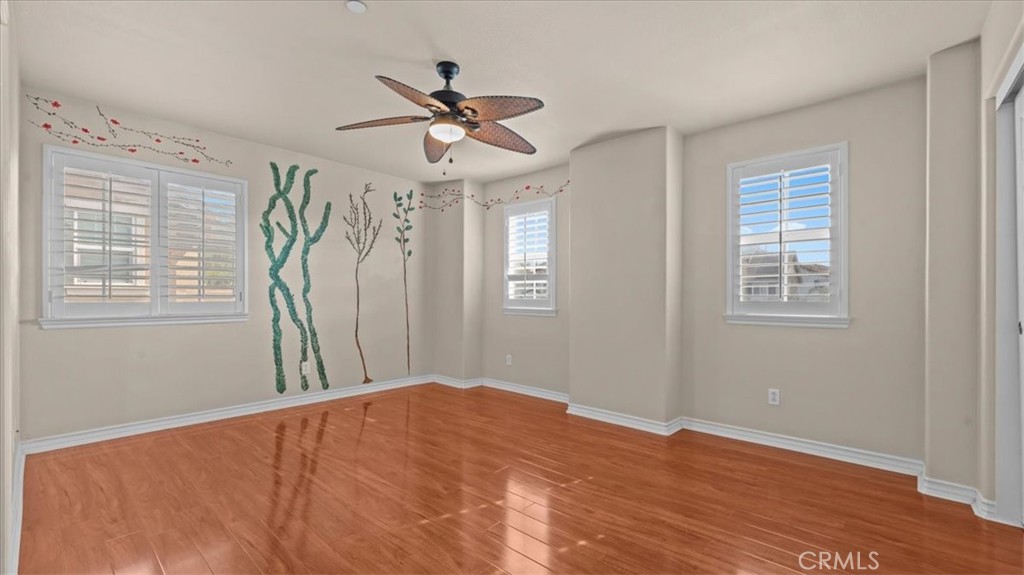 5448 Turin Way Fontana, CA 92336 - Photo 19 of 40 a view of a livingroom with a ceiling fan and window