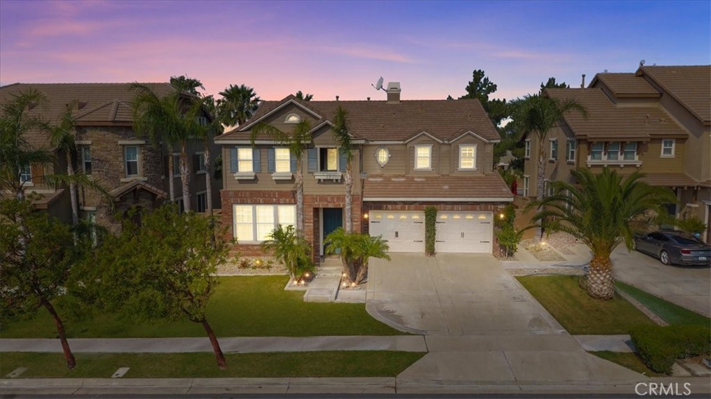 5448 Turin Way Fontana, CA 92336 - Photo 2 of 40 a front view of a house
