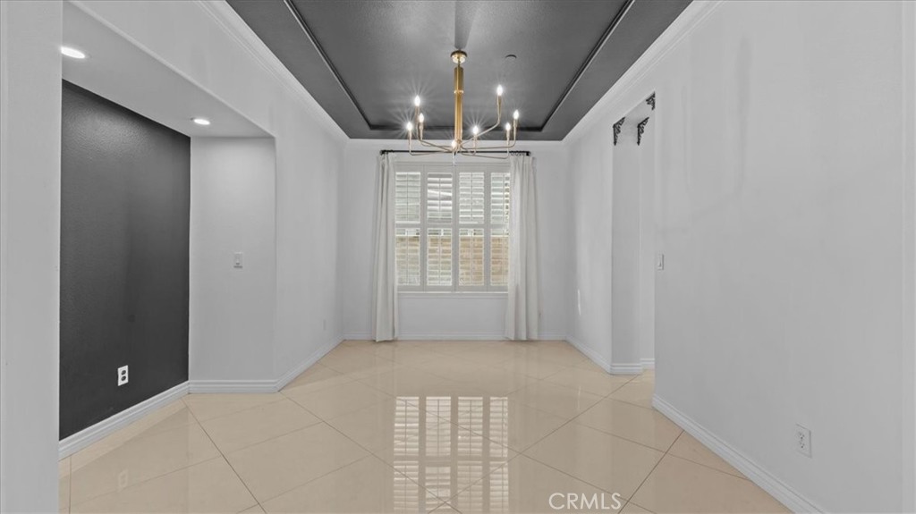 5448 Turin Way Fontana, CA 92336 - Photo 7 of 40 a view of an empty room with a window