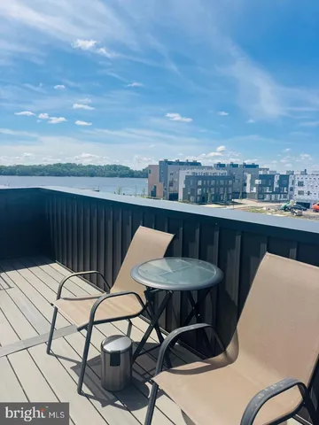 a view of a chairs and table on the terrace