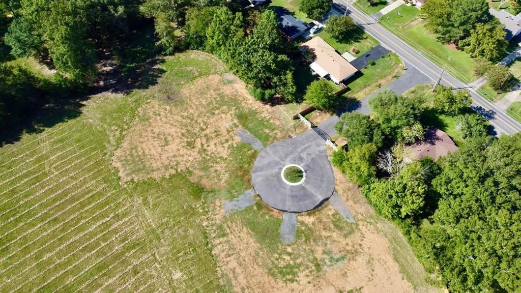 110 Seger Circle Benton, LA 71006 - Photo 4 of 7 a aerial view of a house with a yard and garden
