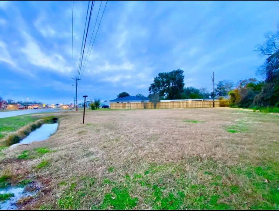 0 North Main Liberty, TX 77575 - Photo 3 of 18 a view of a field with an trees