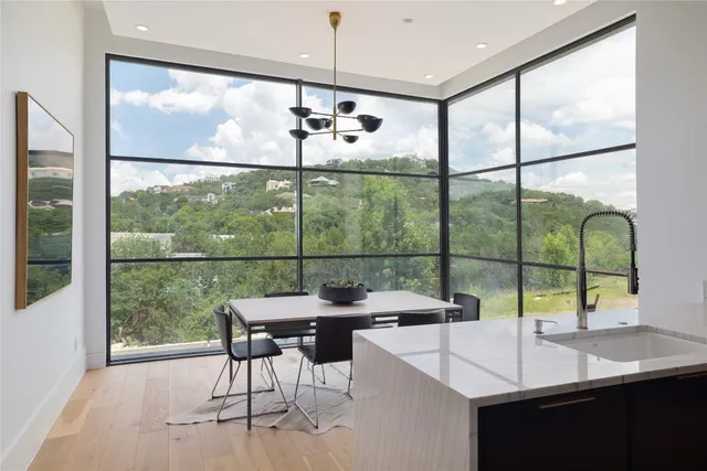 a kitchen with a stove and a refrigerator