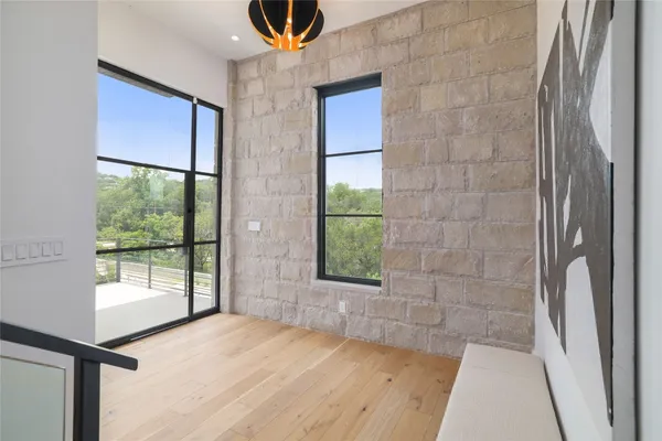 a lobby with furniture and window