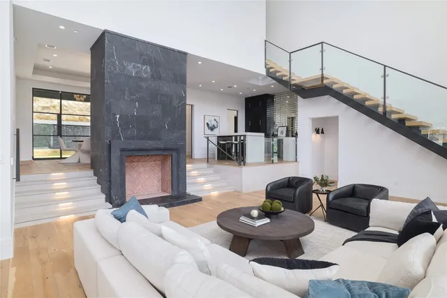a kitchen with a sink and a large window