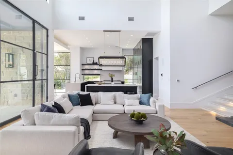 a large bathroom with a large tub and sink