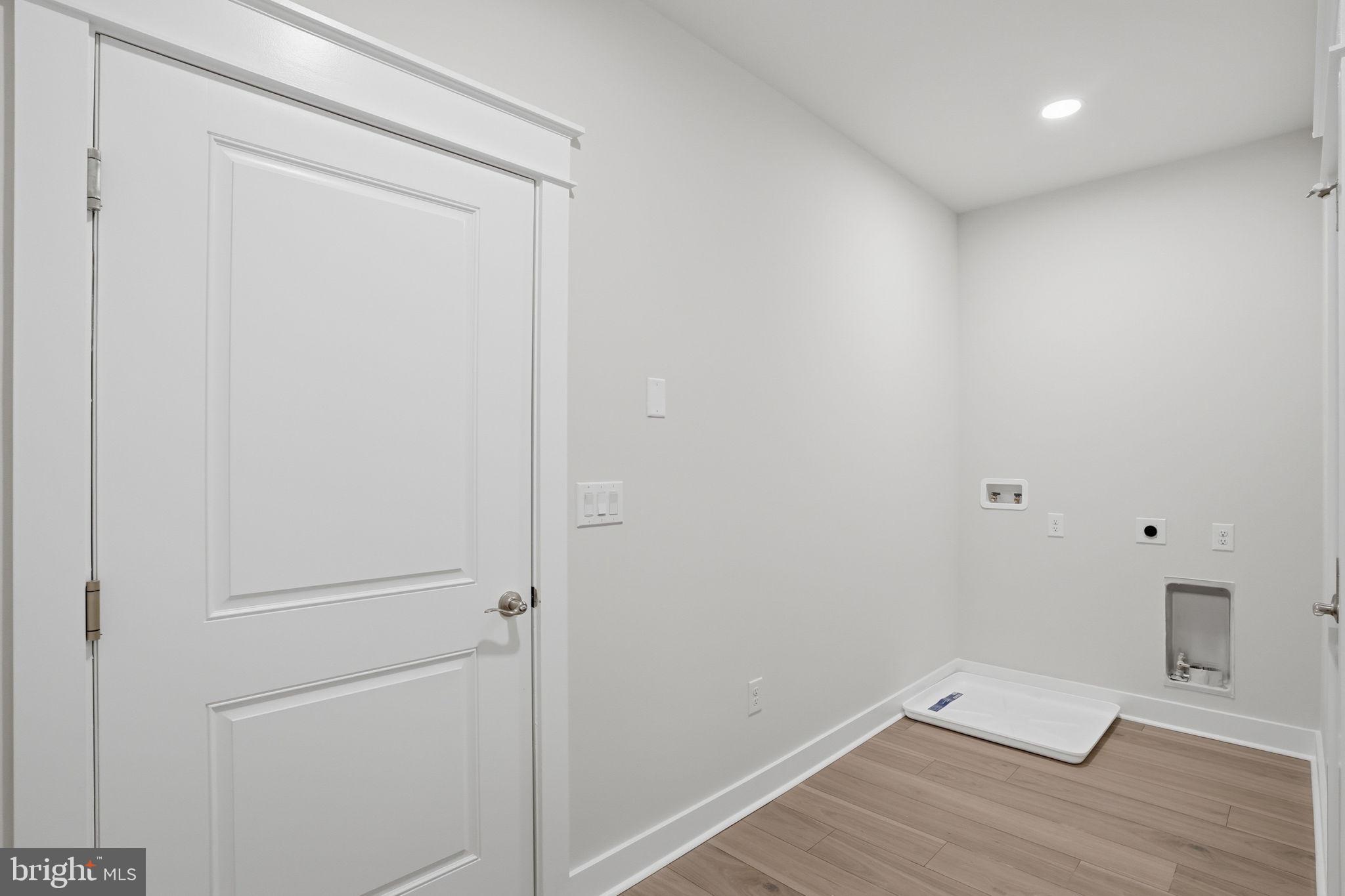 25015 Prairie Lane, Unit 3 Millsboro, DE 19966 - Photo 22 of 42 a view of small space with wooden floor