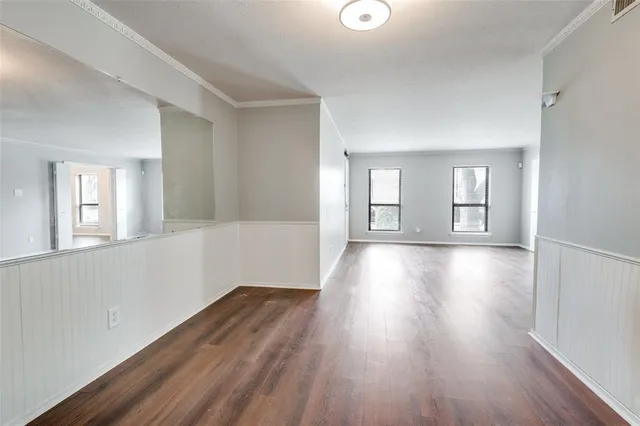 a view of livingroom with hardwood floor and hallway