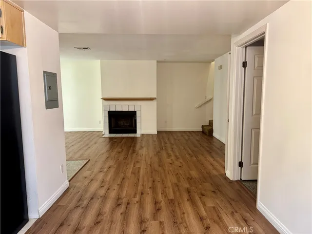 a kitchen with stainless steel appliances a refrigerator and a stove