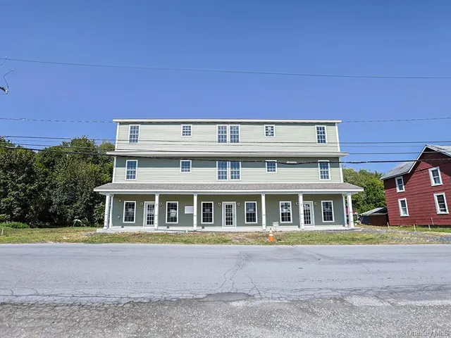 a view of building with large windows