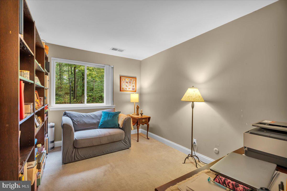 115 East Kings Highway, Unit 443 Maple Shade, NJ 08052 - Photo 17 of 24 a living room with furniture and a window
