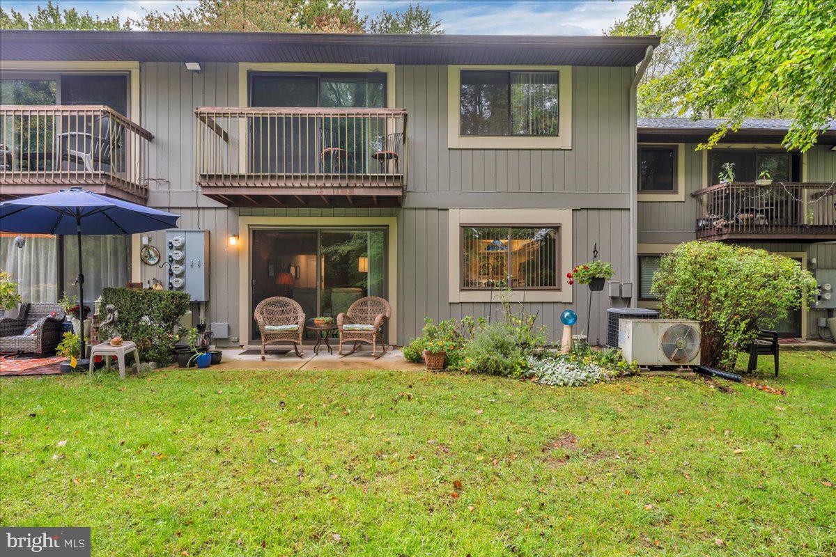 115 East Kings Highway, Unit 443 Maple Shade, NJ 08052 - Photo 21 of 24 a house view with a garden space