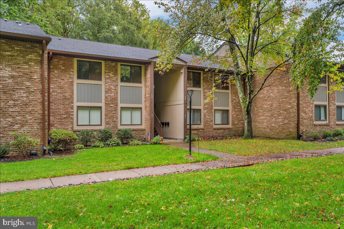 115 East Kings Highway, Unit 443 Maple Shade, NJ 08052 - Photo 3 of 24 a view of a house with a backyard