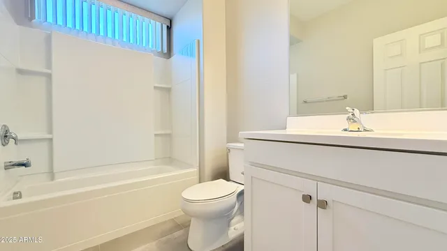 a bathroom with a sink a toilet and a bathtub