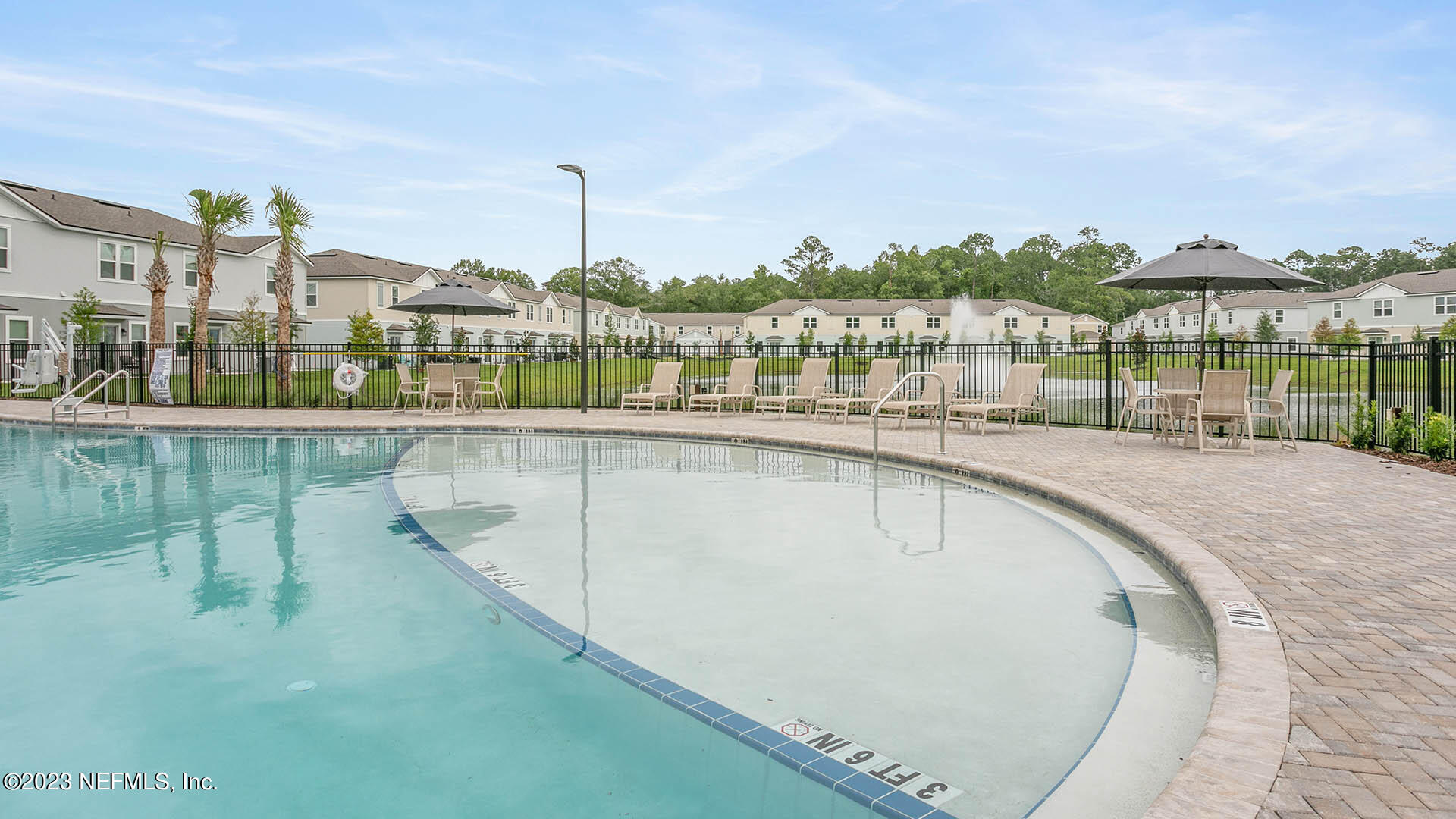 55 Blue Hvn Road St. Augustine, FL 32095 - Photo 23 of 46 a view of a swimming pool with a patio