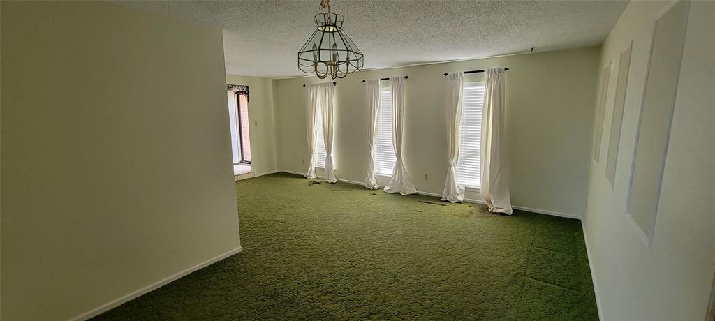7813 Pebbleford Road Fort Worth, TX 76134 - Photo 10 of 23 a view of a bathroom with window