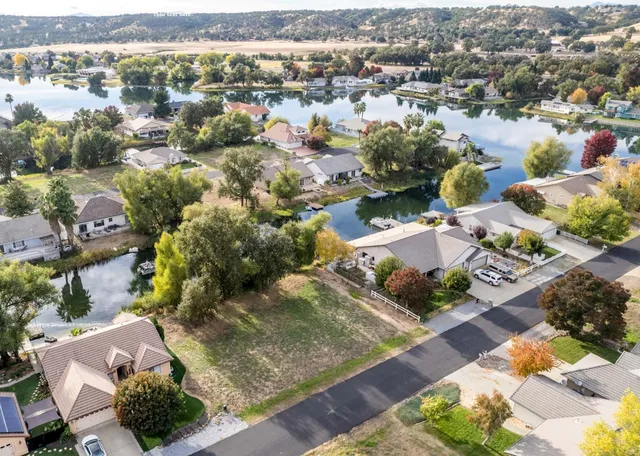 a front view of a building with small garden